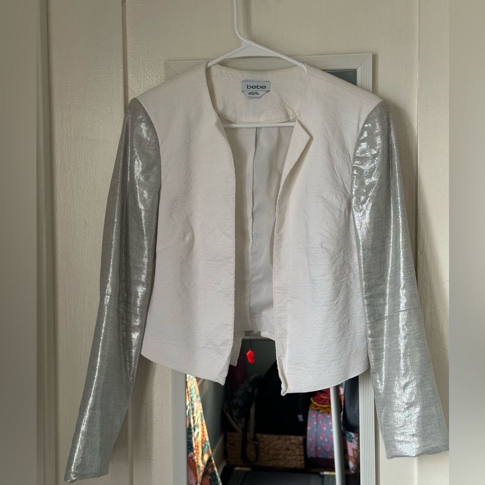 White jacket with silver sleeves